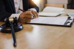 lawyer reviewing a will